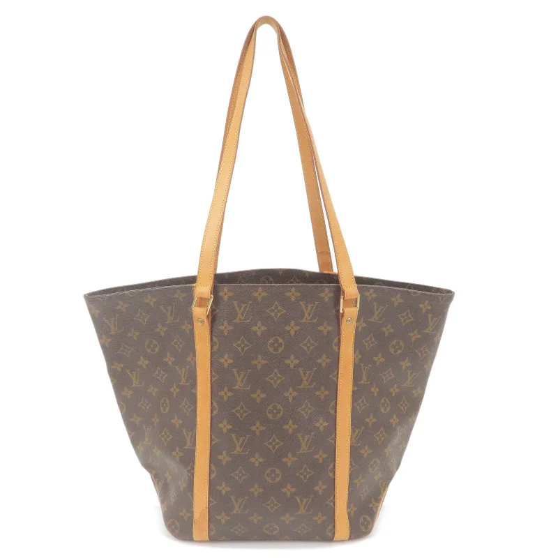 Louis Vuitton Twist bags with a contrast - colored interior for visual interestLouis Vuitton Monogram Sac Shopping Shoulder Bag Brown M51108