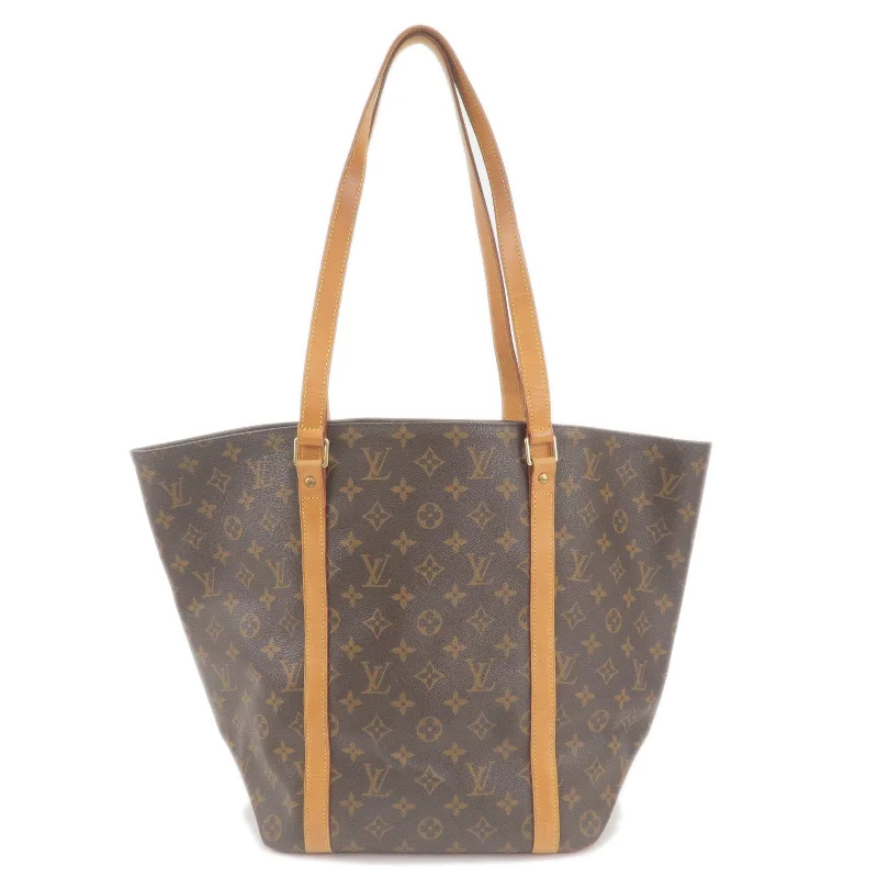 Ladies Louis Vuitton Petite Malle bags in a pastel color for a soft lookLouis Vuitton Monogram Sac Shopping Shoulder Bag M51108