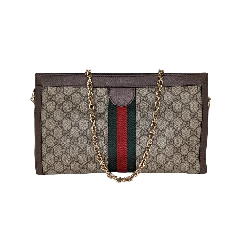 Women Gucci crossbody bags in a bold red colorGucci GG Supreme Monogram Web Medium Ophidia Chain Shoulder Bag