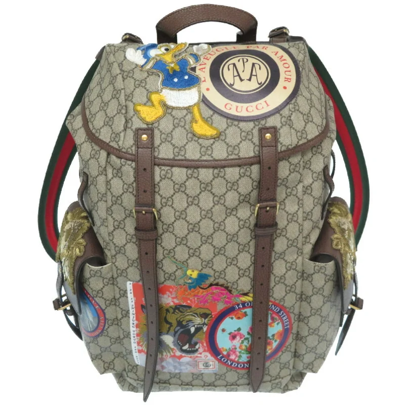 Women Gucci Sylvie bags with a detachable ribbon detailGucci Disney Collaboration Neo Vintage GG Supreme 460029 Rucksack Daypack Donald Duck Bag