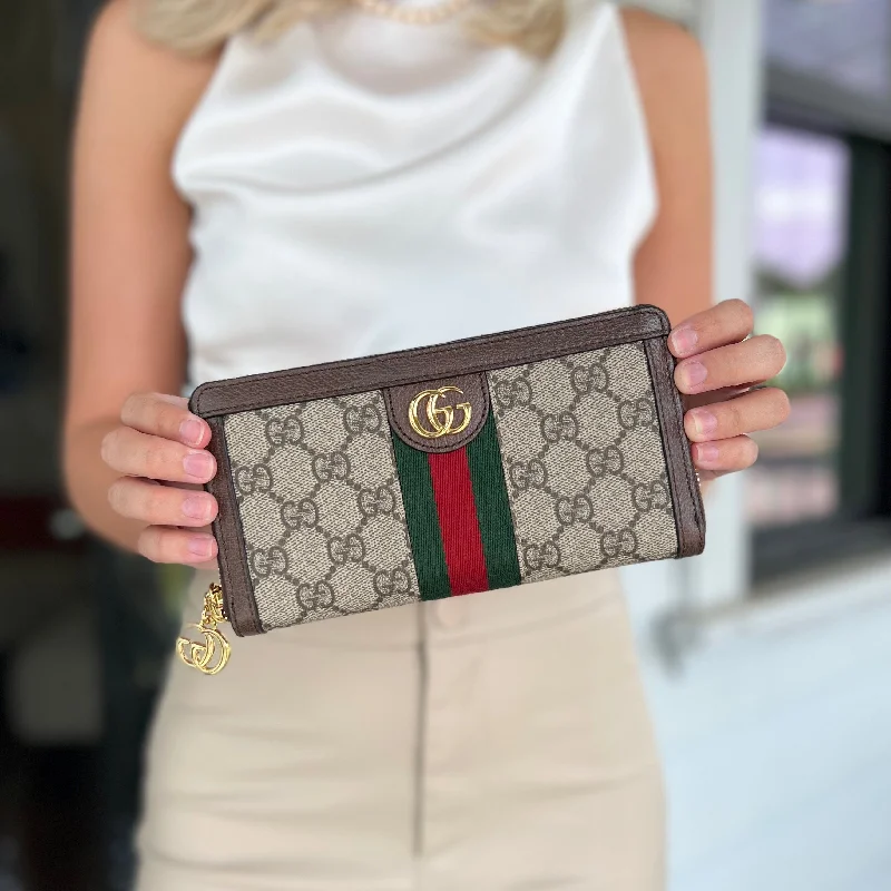 Women Gucci Sylvie bags featuring the signature web stripeGucci GG Ophidia Zip Around Wallet