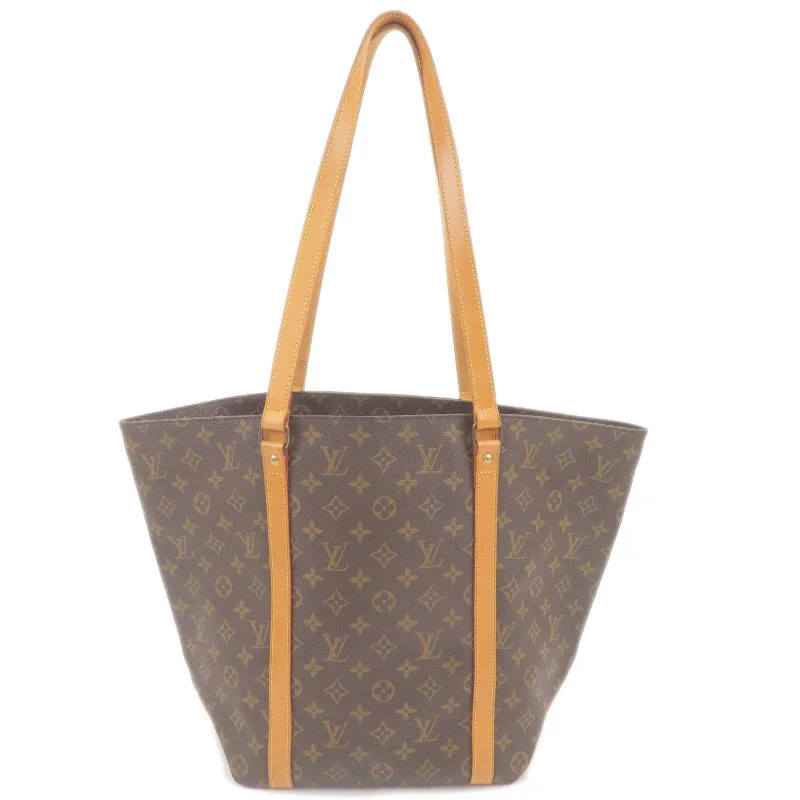 Louis Vuitton Twist bags with a crystal - embellished LV - turnlockLouis Vuitton Monogram Sac Shopping Shoulder Bag M51108