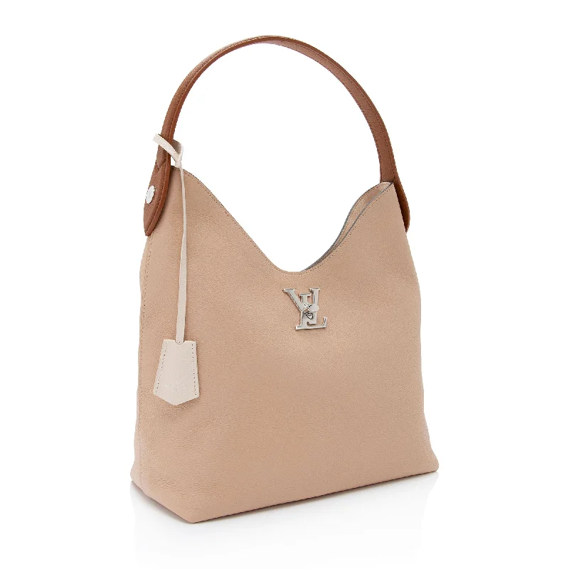 Louis Vuitton Twist bags with the iconic LV - turnlock closureLouis Vuitton Calfskin Lockme Hobo (qylTpe)