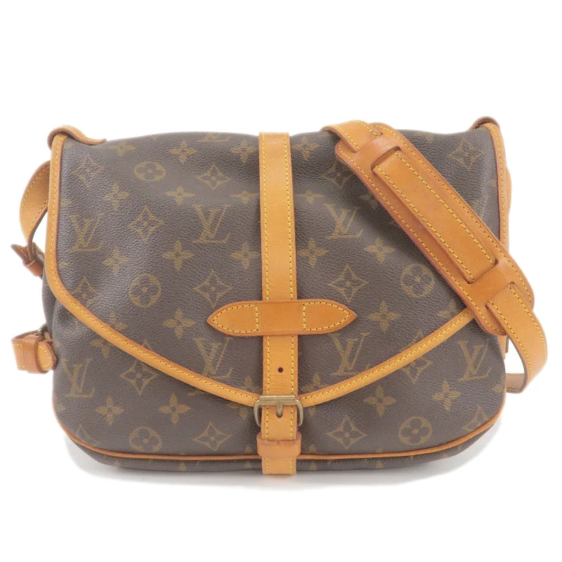 Louis Vuitton bags with a snap - button closure and a decorative charm for styleLouis Vuitton Monogram Saumur 30 Shoulder Bag M40710