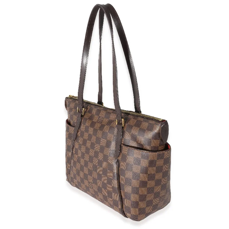 Louis Vuitton Twist bags with a contrast - colored interior for visual interestLouis Vuitton Damier Ebene Canvas Totally PM