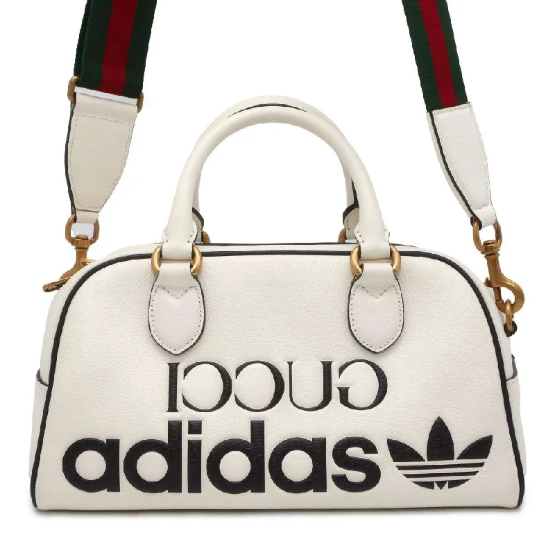 Gucci Marmont bags for women with quilted leather exteriorsGUCCI Mini Duffle Bag Adidas collaboration White/Black 702397 Leather