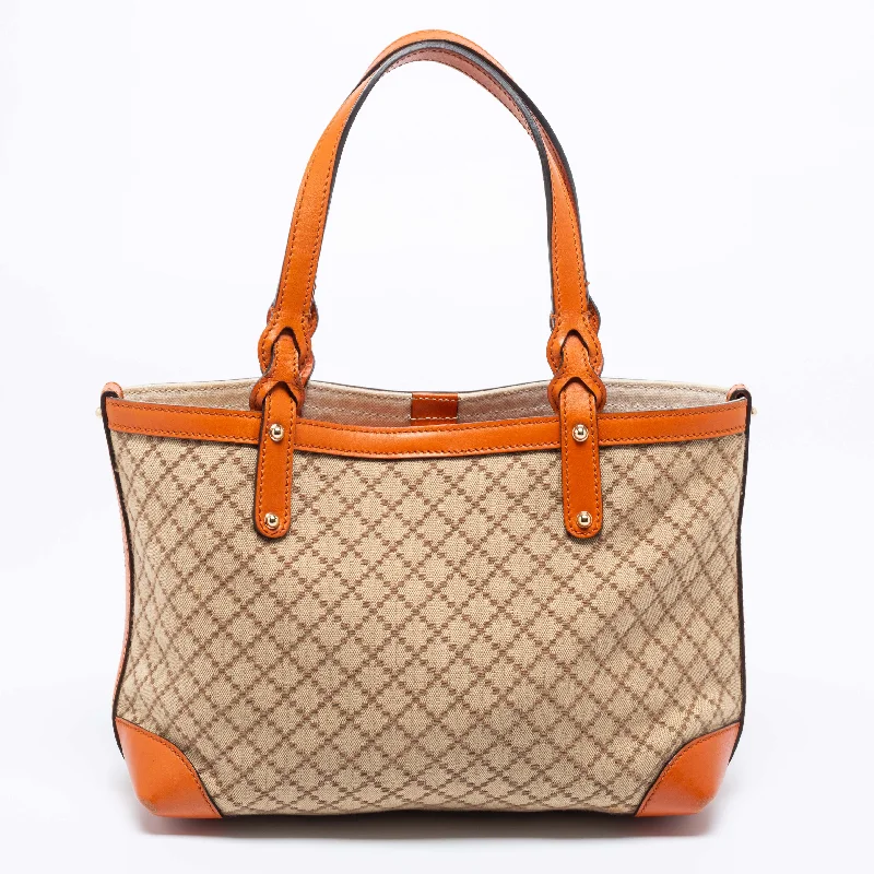 Women Gucci Sylvie bags with a leather - wrapped handleGucci Orange/Beige Diamante Canvas and Leather Small Craft Tote