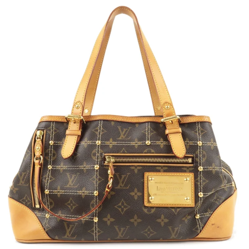 Ladies Louis Vuitton shoulder bags with a tassel decoration for charmLouis Vuitton Monogram Rivet Hand Bag Shoulder Bag M40140