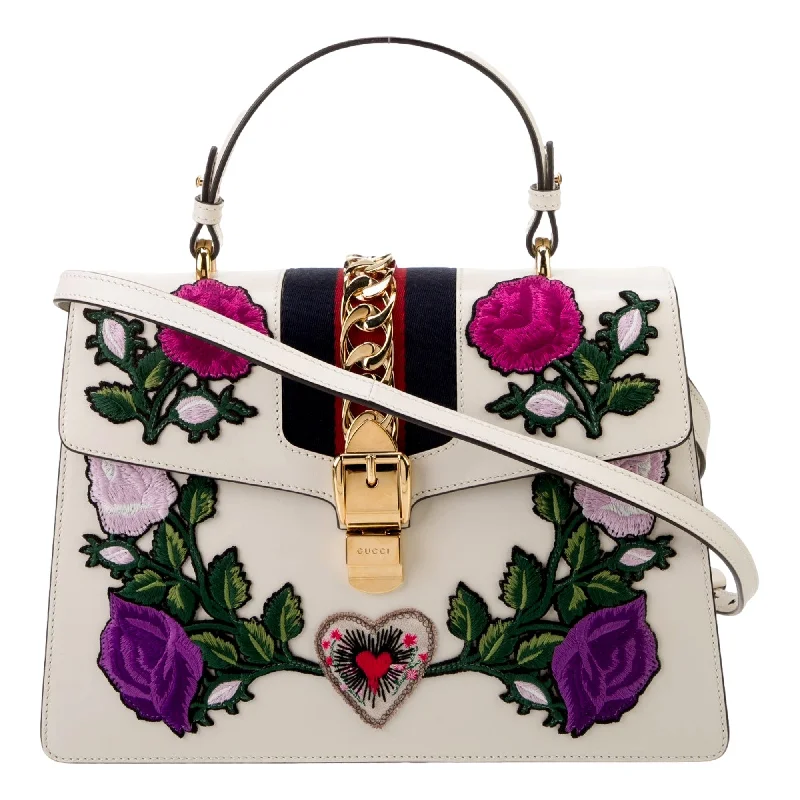 Ladies Gucci shoulder bags with a magnetic - closure flapGucci Sylvie Embroidered Off White Medium Top Handle Bag