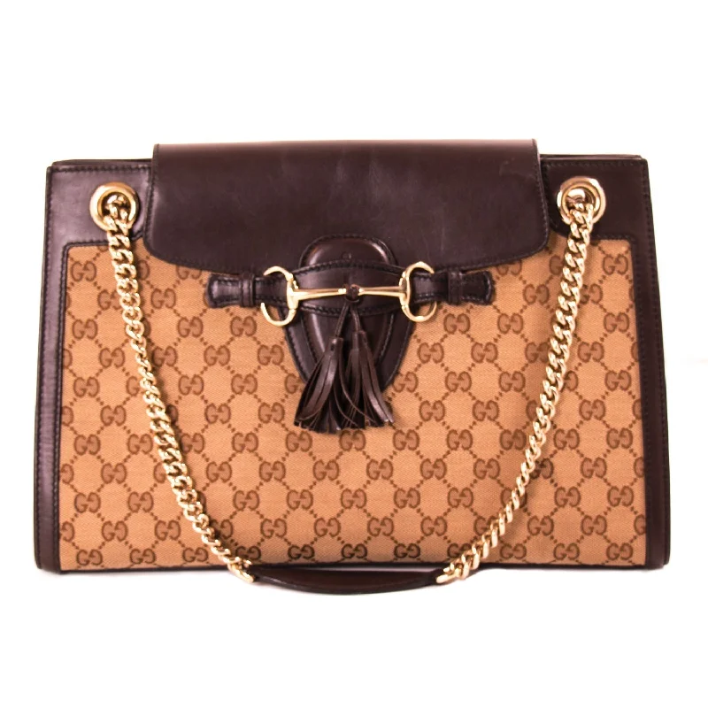 Women Gucci bags with interlocking G hardware for a classic lookGucci GG Canvas Emily Large Shoulder Bag