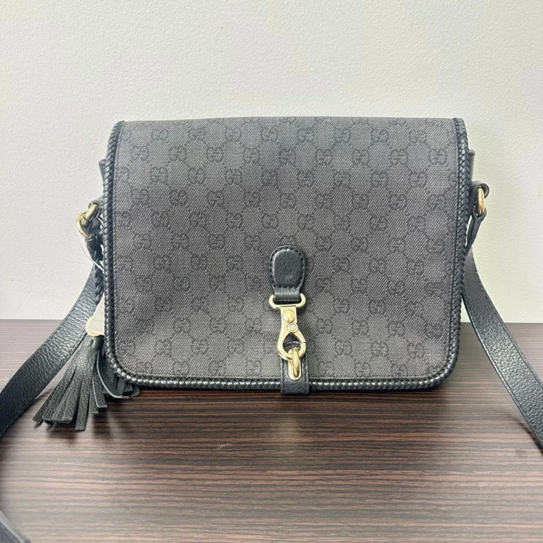 Women Gucci Sylvie bags with a leather - wrapped handleGucci GG Canvas Leather Crossbody Black Medium Size