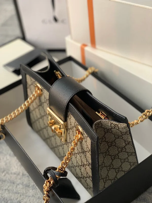 Women Gucci Sylvie bags with a leather - wrapped handleGucci Padlock GG Small Shoulder Bag