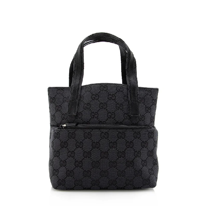 Women Gucci Sylvie bags with a crystal - embellished web stripeGucci GG Canvas Front Pocket Mini Tote