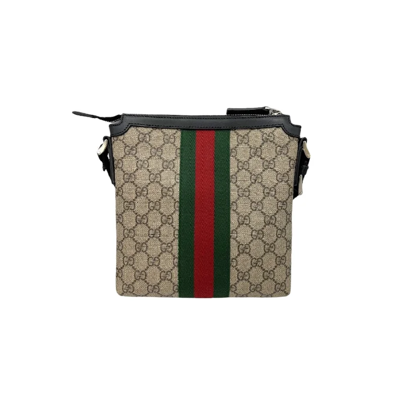 Women Gucci crossbody bags in a bold red colorGucci GG Canvas Web Messenger Bag