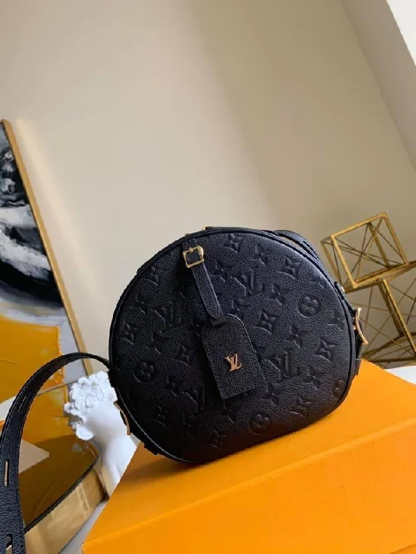 Louis Vuitton bags with a snap - button closure and a decorative charm for styleLouis Vuitton Boite Chapeau Souple MM Bag