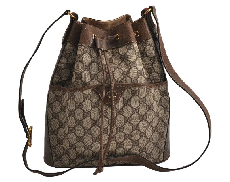 Women Gucci Sylvie bags featuring the signature web stripeAuthentic GUCCI Web Sherry Line Drawstring Bag GG PVC Leather Brown Junk 0417K