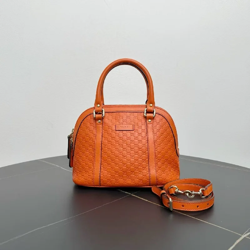 Gucci handbags for women with a metal - framed claspGucci Orange Leather Shell Wrap Handbag Small