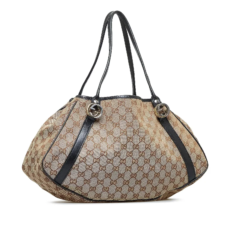 Women Gucci bags with interlocking G hardware for a classic lookGucci GG Canvas Twins Tote (SHG-jumYPU)