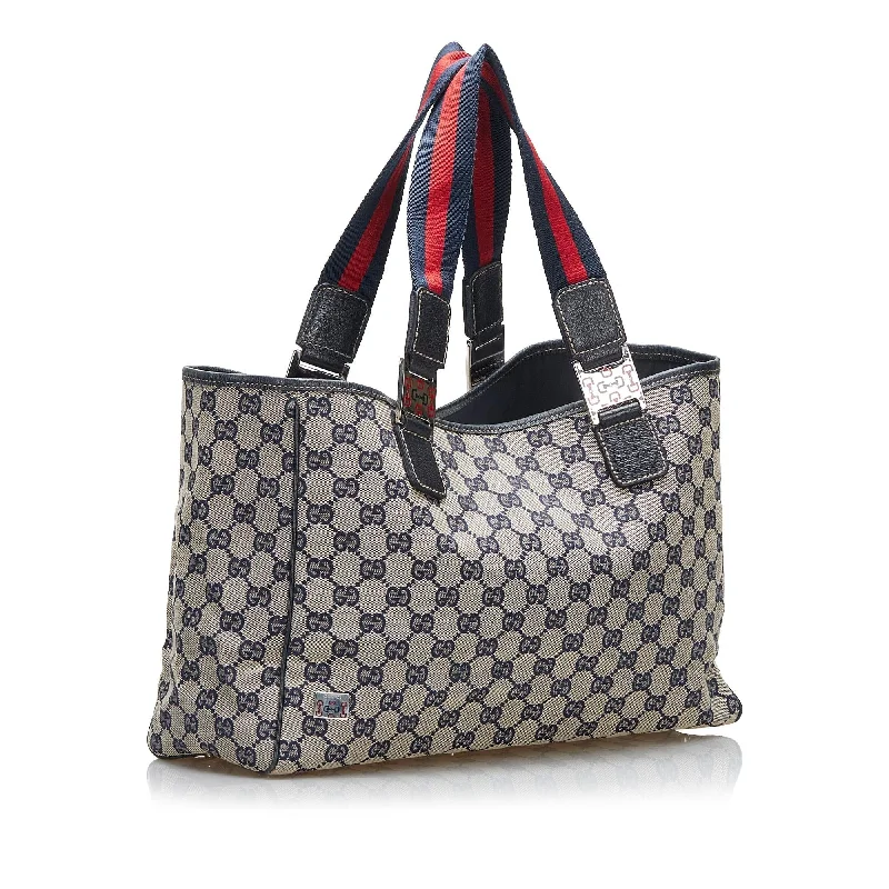 Ladies Gucci shoulder bags with a tassel decorationGucci GG Canvas Web Pop Tote Bag (SHG-8Vt96e)