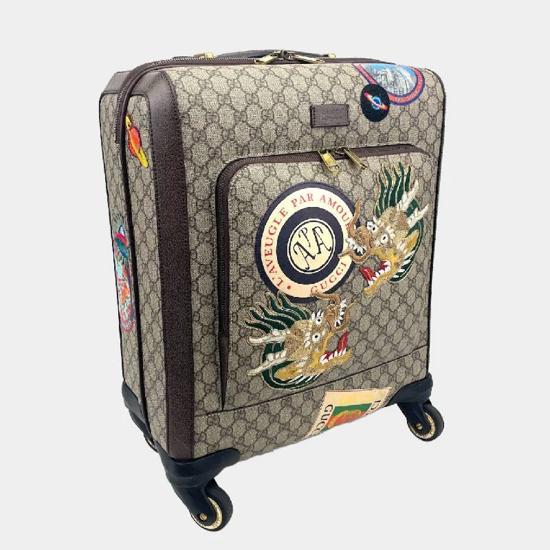 Gucci backpacks for women with a hidden back pocketGUCCI GG Supreme Carry-On Suitcase- Travel Patches