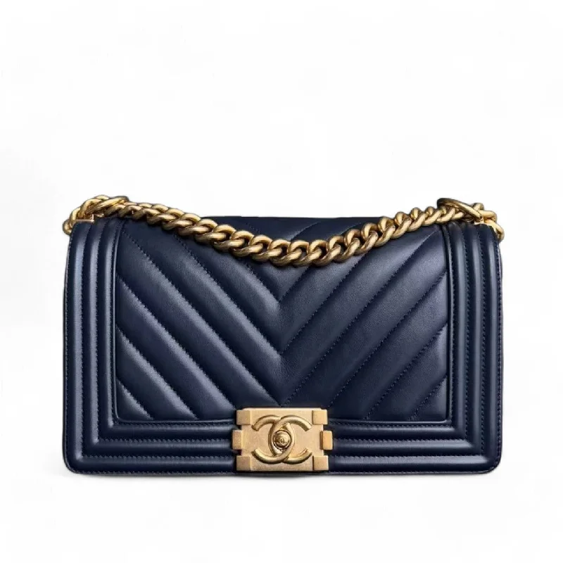 Chanel Quilted Leather Shoulder Bag for FashionistasChanel Boy Medium - 25CM Chevron Lambskin Dark Navy Blue Gold Hardware Series 25