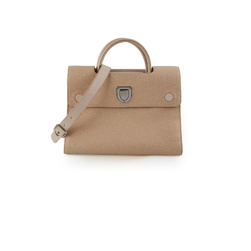 Christian Dior handbags with a snap - button closure and a decorative buckleChristian Dior Diorever Beige Tote