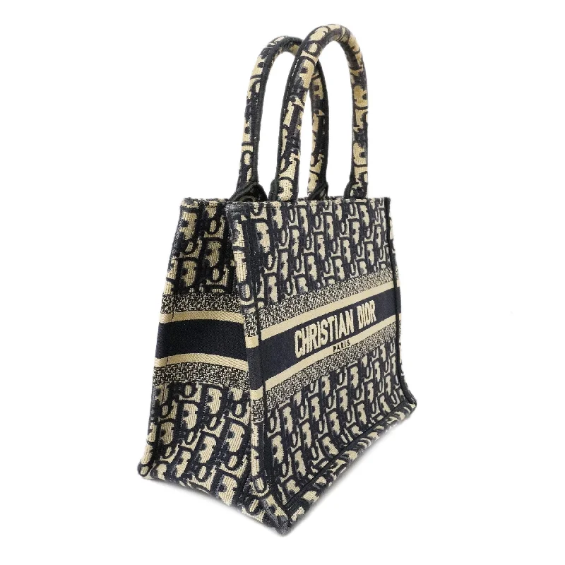 Christian Dior Saddle bags with a studded trim for a bold lookCHRISTIAN DIOR  Book Tote Small Women's Canvas Tote Bag Navy