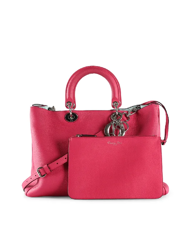 Christian Dior bags with a zip - top closure and multiple compartmentsCHRISTIAN DIOR Fuchsia Pebbled Leather Large Diorissimo Shopper Tote Bag