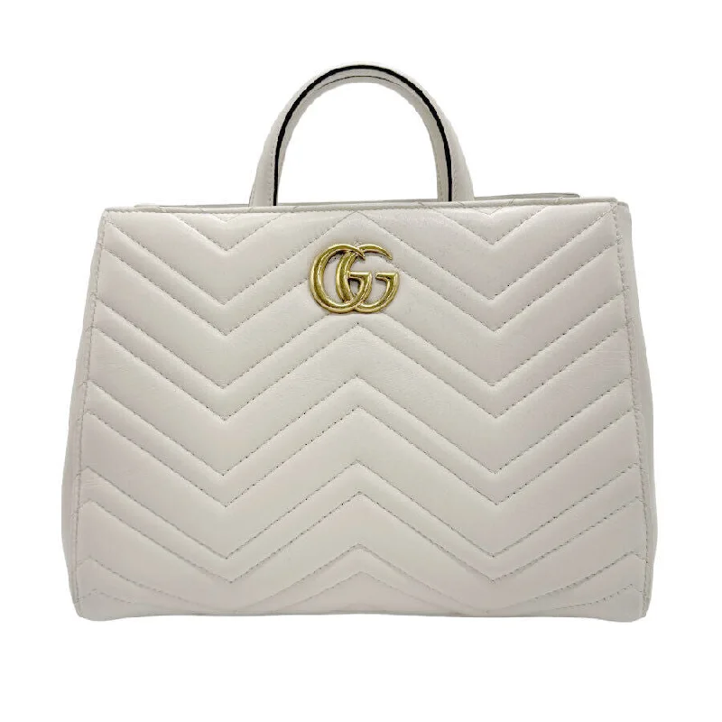 Women Gucci bags with a snap - button closure and a decorative charmGucci Gg Marmont Handbag Shoulder